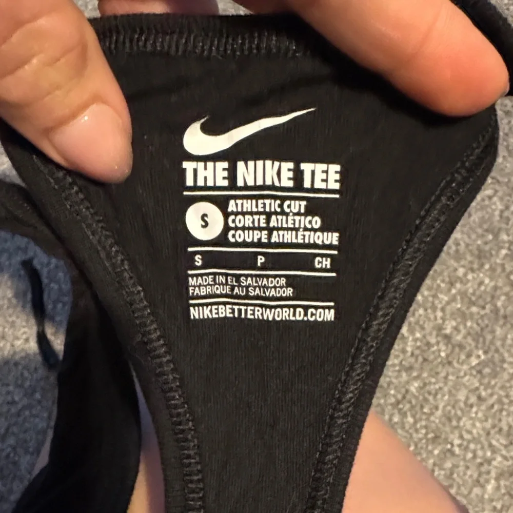 Nike Women's Black Tank Top with Red Swoosh